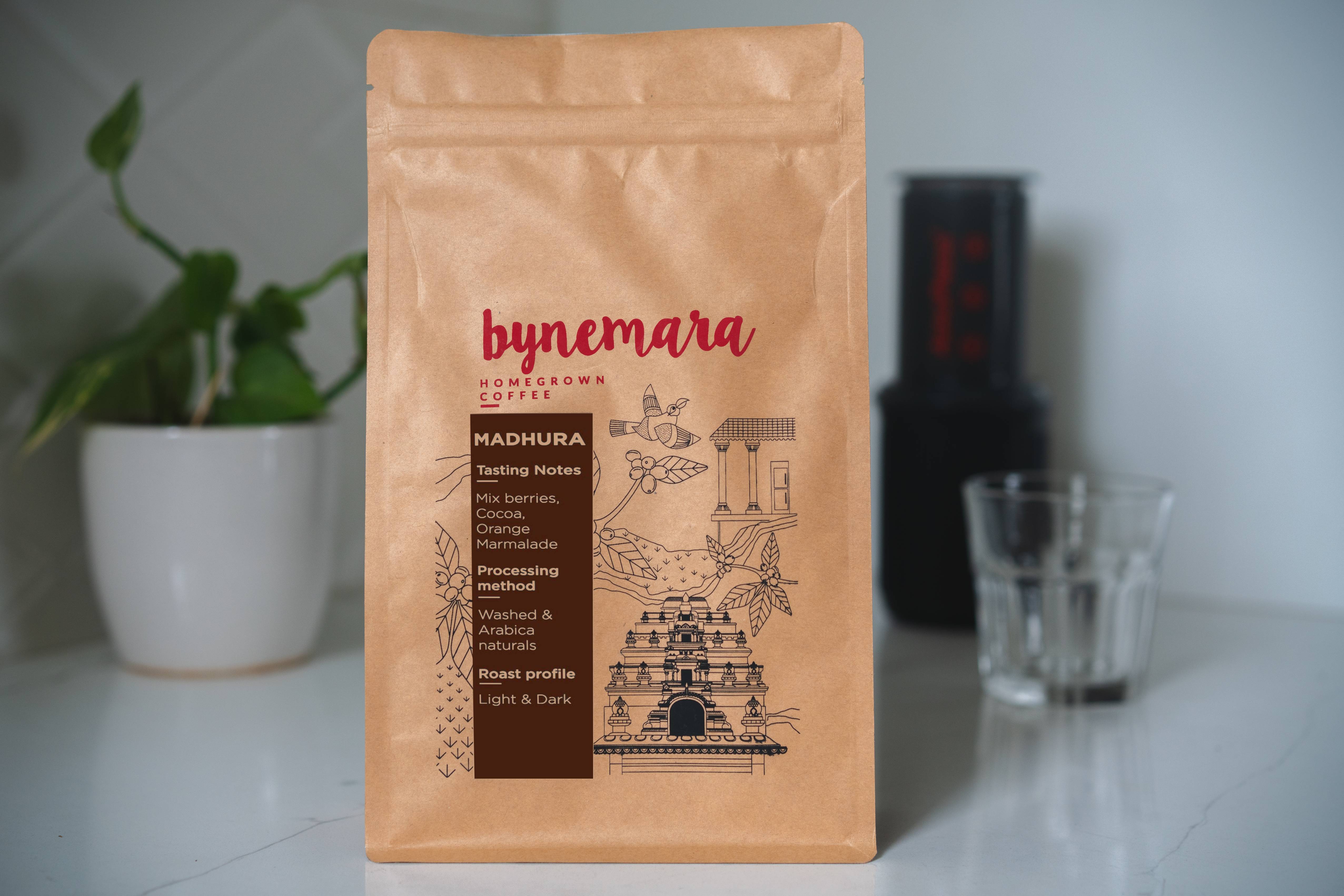 madhura speciality coffee packet with tasting note of mix berries, cocca, orange marmalade and a roast profile of light and dark